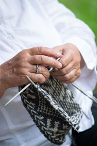 Close-up of woman holding hands