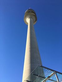 Low angle view of building against blue sky