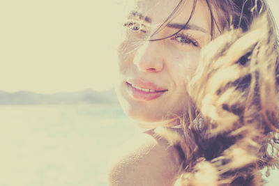 Portrait of young woman looking away