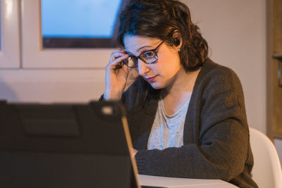 White woman working from home