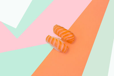 High angle view of human hand on paper