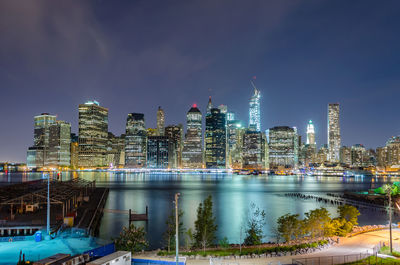 Scenic view at night of modern skyscrapers in lower manhattan, new york city, usa.