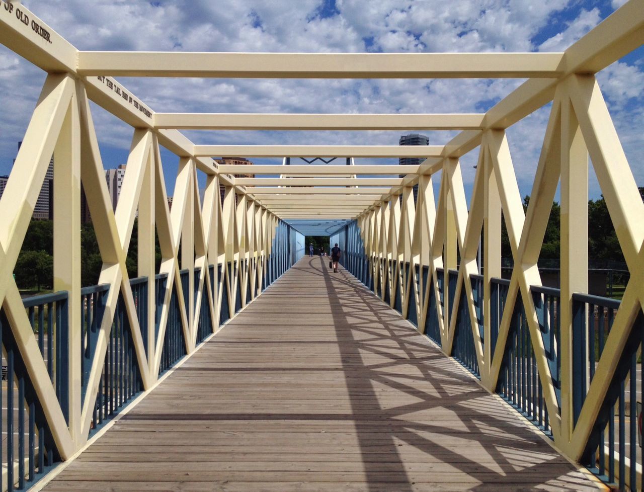 connection, the way forward, bridge - man made structure, built structure, diminishing perspective, architecture, sky, vanishing point, engineering, railing, bridge, long, footbridge, transportation, metal, low angle view, day, cloud - sky, outdoors, no people