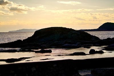 Scenic view of sea against sky during sunset