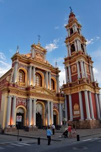 Facade of historic building against sky