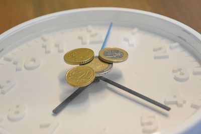 High angle view of clock on table