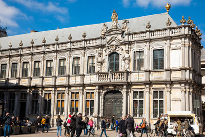 Group of people in front of building