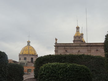 View of cathedral against cloudy sky