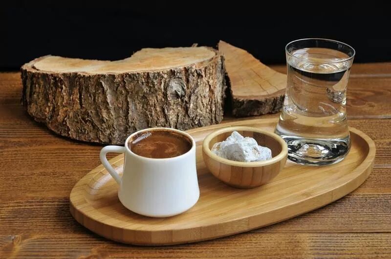 food and drink, table, drink, freshness, indoors, refreshment, still life, coffee - drink, coffee cup, food, drinking glass, wood - material, saucer, high angle view, close-up, ready-to-eat, healthy eating, wooden, breakfast, bread