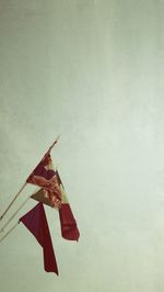 Low angle view of flag against sky