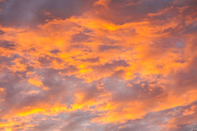 Low angle view of dramatic sky during sunset