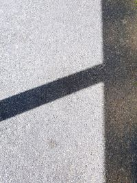 High angle view of shadow on road