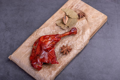 High angle view of meat on cutting board