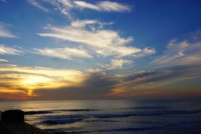 Scenic view of sea against sky during sunset