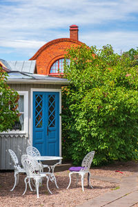 Patio with garden furniture in an idyllic garden