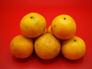 Close-up of apples on orange