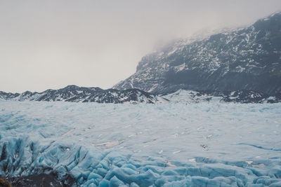 Iced valley in mountain bottom landscape photo