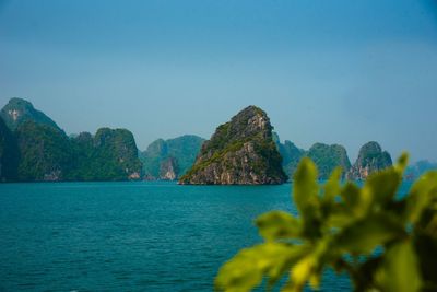 Scenic view of sea against clear blue sky