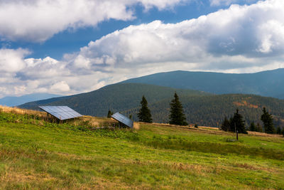 Photovoltaic panels in the mountains. electric power supply for a mountain chalet. beautiful 