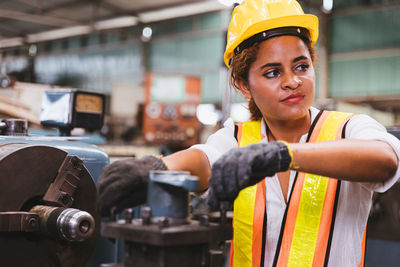 Portrait of man working in factory