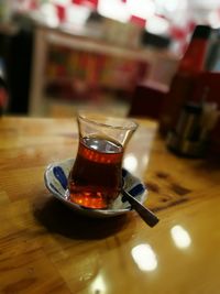 Close-up of coffee cup on table