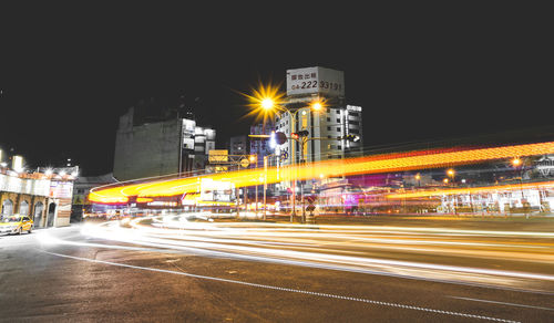 Light trails on city street at night