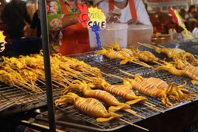 Close-up of seafood on barbecue grill