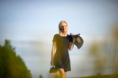 Man smiling while sitting outdoors