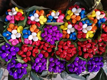 High angle view of multi colored candies for sale at market stall