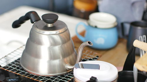 Close-up of teapot on camping stove