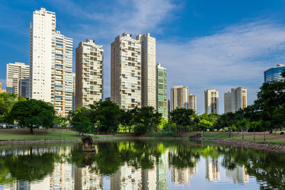 Reflection of city on river