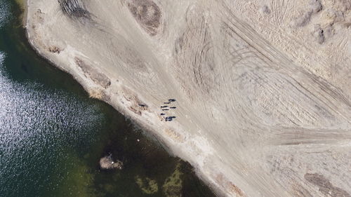 High angle view of surf on the beach