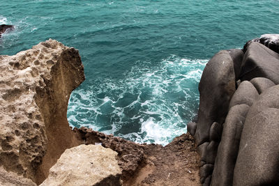 High angle view of rocks on beach