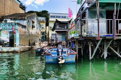 Boats moored in canal