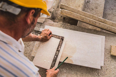 Man working on barbecue grill