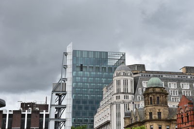View of buildings in city against sky