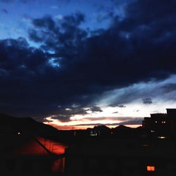 Low angle view of cloudy sky at dusk