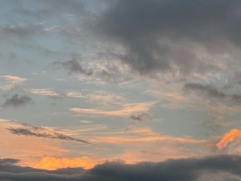 Low angle view of dramatic sky during sunset