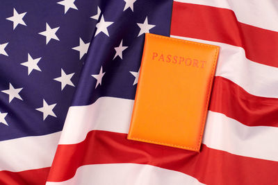 Close-up of flags against blue sky