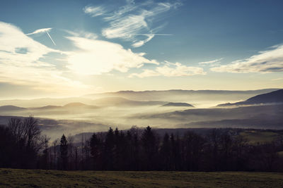 Scenic view of landscape against sky during sunset