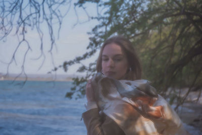 Portrait of young woman looking away