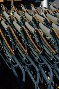 Close-up of chairs arranged indoors