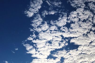 Low angle view of blue sky and clouds