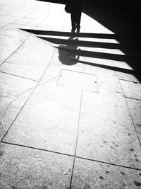 Low section of people walking on footpath