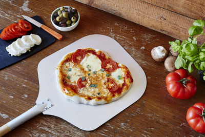 High angle view of pizza on table