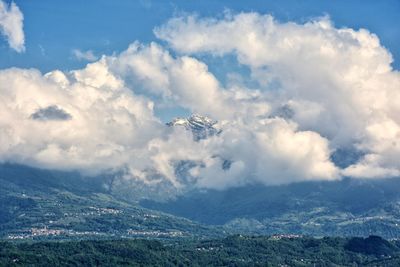 Aerial view of clouds over mountain