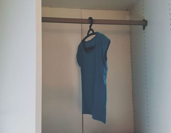 Clothes hanging on wall at home