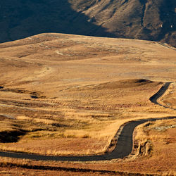 High angle view of road passing through desert