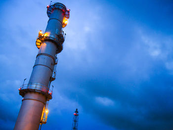 Low angle view of illuminated building at night