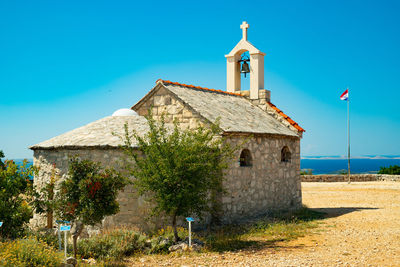 Built structure against clear blue sky